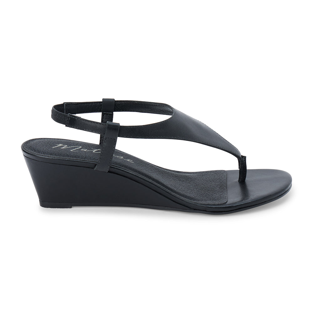 Black leather wedge sandal with slingback strap and open toe shown on a white background.