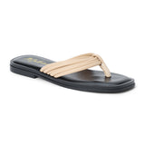 Beige leather flip flop sandal with multiple tubular straps gathered in a knotted design and a flat sole shown on a white background.