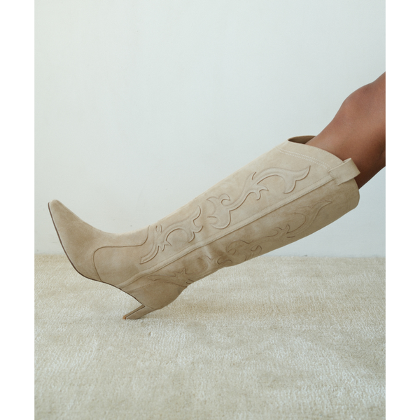 Abrams Western Boot – Coconuts by Matisse – Tall vegan suede boot in a soft beige tone with western-inspired stitching, pointed toe, and slim high heel.