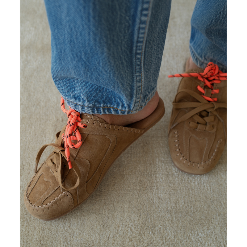 Devyn Sneaker Mule – Coconuts by Matisse – Tan suede mule with moccasin-style stitching, sporty lace-up detail, and open back. A laid-back hybrid silhouette blending slipper comfort with sneaker edge.