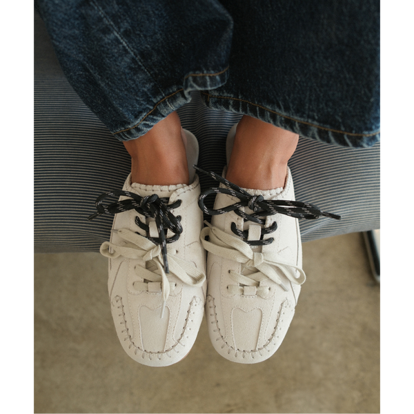 Devyn Sneaker Mule – Coconuts by Matisse – Light grey suede mule with moccasin-style stitching, sporty lace-up detail, and open back. A laid-back hybrid silhouette blending slipper comfort with sneaker edge.