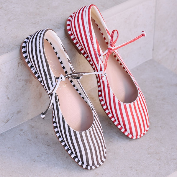 Gerry Ballet Flats – Coconuts By Matisse – Striped ballet flat with a rounded toe, delicate crossover tie, and classic bow detail. A playful take on nautical style with feminine charm and everyday ease.