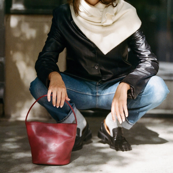 Vancouver Bucket Bag - Matisse Footwear - Minimalist bucket bag in smooth, wine red leather with a seamless silhouette and a single shoulder strap. A versatile and unstructured carryall with effortless, elevated appeal.