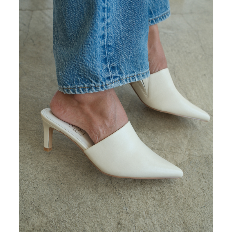 Garret Heeled Mule – Beach by Matisse – Ivory pointed-toe slip-on mule with smooth finish and stiletto heel.