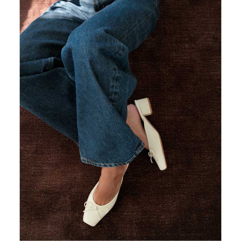 Geneva Heeled Mule – Coconuts by Matisse – Ivory croc-embossed mule with a square toe, low block heel, and delicate bow detail.