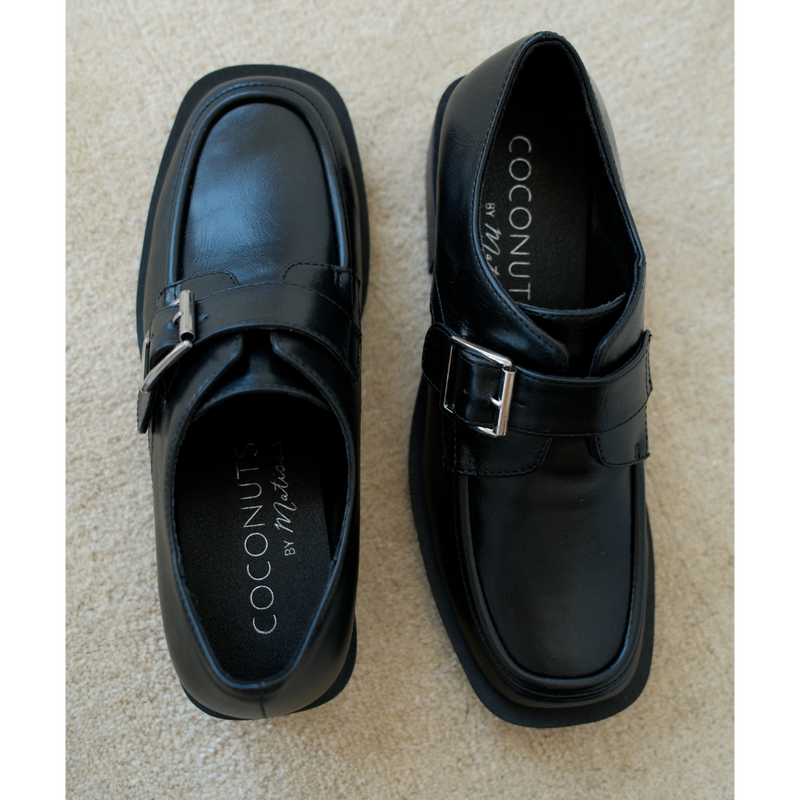 Hilary Loafer – Coconuts by Matisse – Black faux leather loafer with oversized buckle and low block heel.