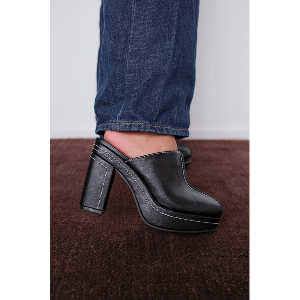 Krista Vegan Platform Mule – Coconuts by Matisse – Black faux leather platform mule with block heel and contrast stitching.
