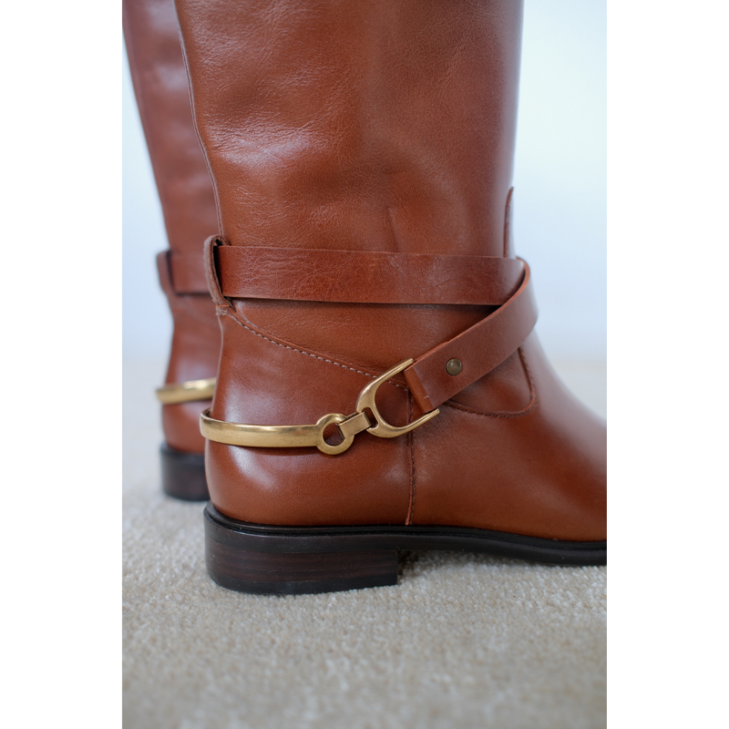 Richmond Knee-High Boot – Matisse – Tall cognac leather boot with equestrian-inspired harness strap and gold hardware.