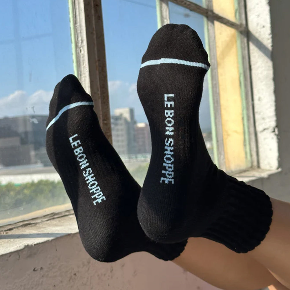 Le Bon Shoppe Swing Socks - Matisse – Black ankle socks with ribbed crew design, light blue logo, and contrast trim