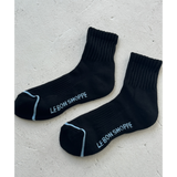 Le Bon Shoppe Swing Socks - Matisse – Black ankle socks with ribbed crew design, light blue logo, and contrast trim