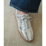 Wylder Vegan Low-Top Sneaker – Coconuts by Matisse – Metallic silver faux-leather sneaker with tonal stitching and gum sole.