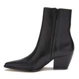Sleek and versatile, these black leather ankle boots feature a pointed toe, side zipper, and stacked block heel. A timeless essential for any wardrobe.