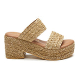 Ocean Ave Platform Sandal – Beach By Matisse – Tan raffia platform sandals with a chunky heel, dual foot straps, and cushioned insole. A beach-to-brunch essential blending texture, height, and easy elegance.