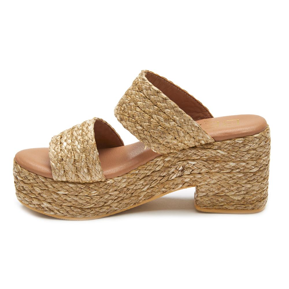 Ocean Ave Platform Sandal – Beach By Matisse – Tan raffia platform sandals with a chunky heel, dual foot straps, and cushioned insole. A beach-to-brunch essential blending texture, height, and easy elegance.